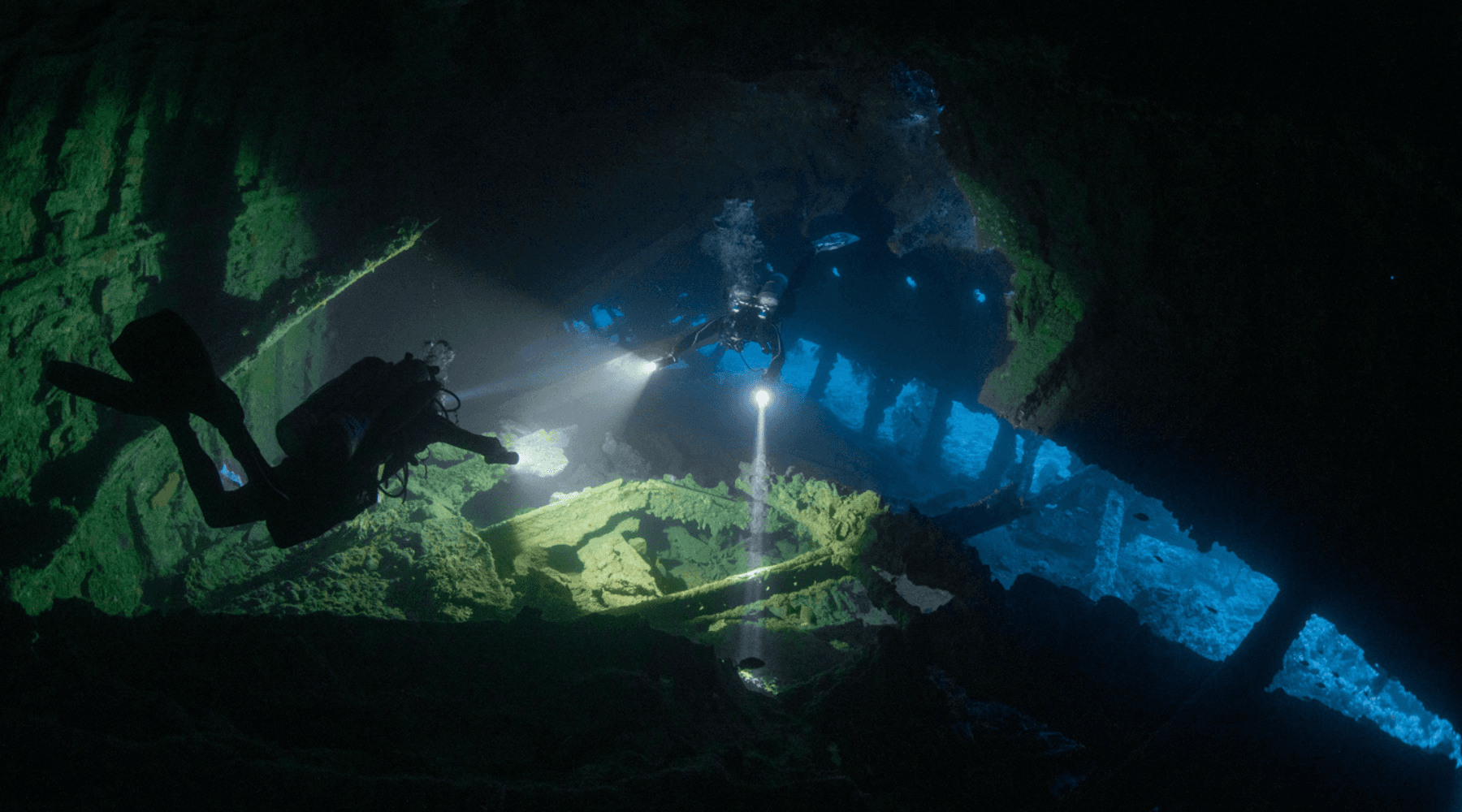 Divers exploring a wreck