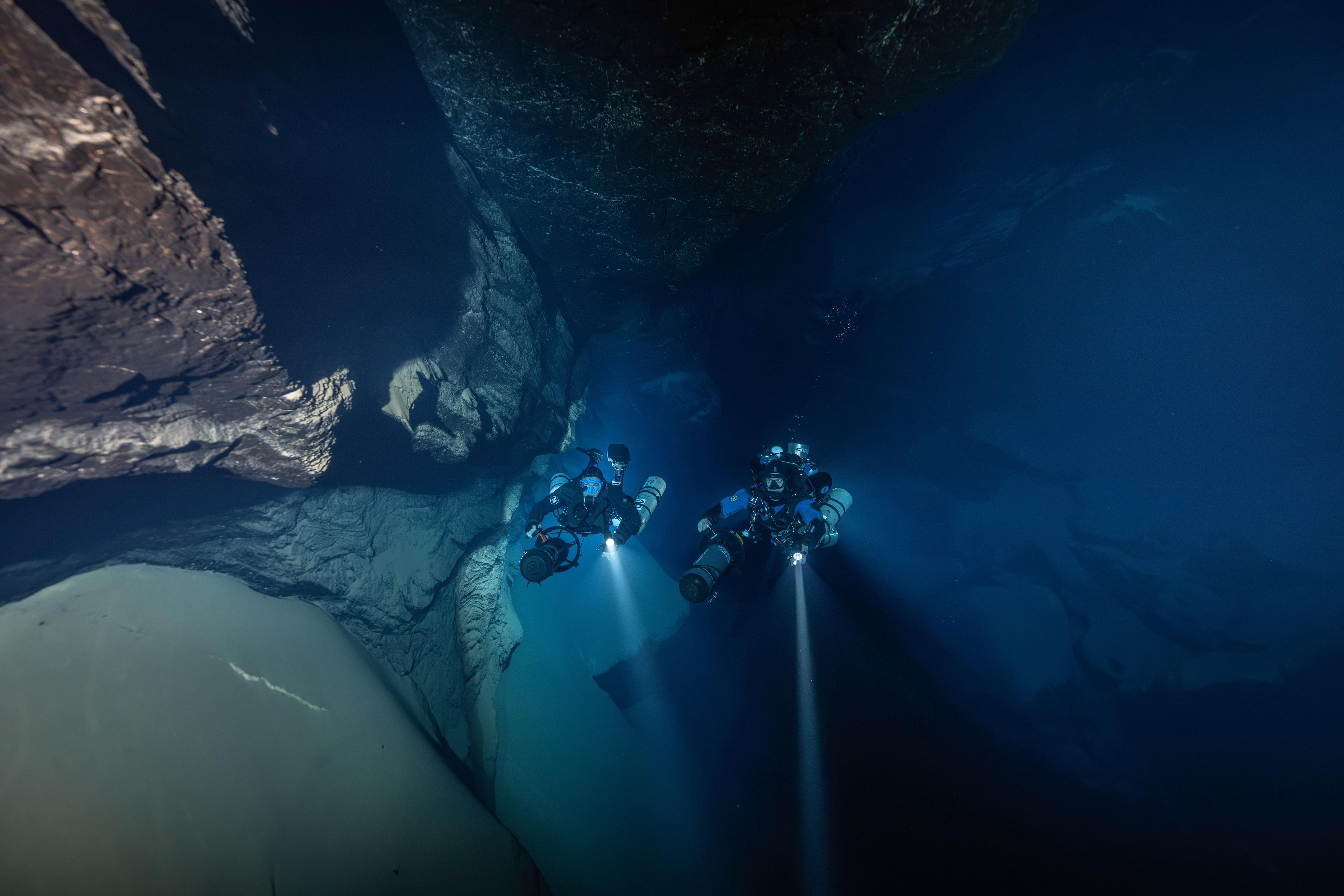 Halcyon divers in a cave